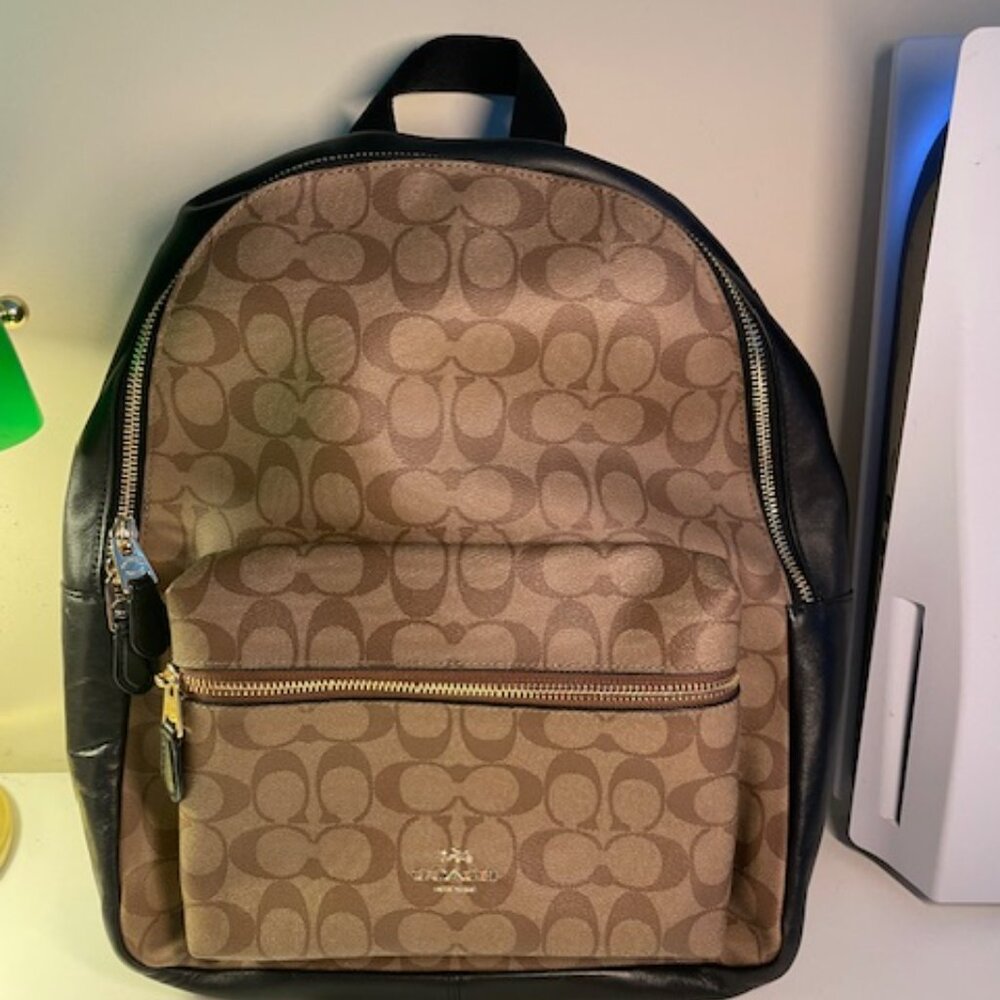 Coach Backpack mutt pocket black and brown with gold zippers